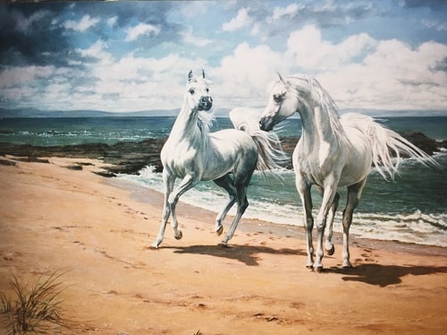 Painting of two white arabs on the beach